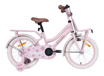 Rosa Kinderfahrrad mit Stützrädern.